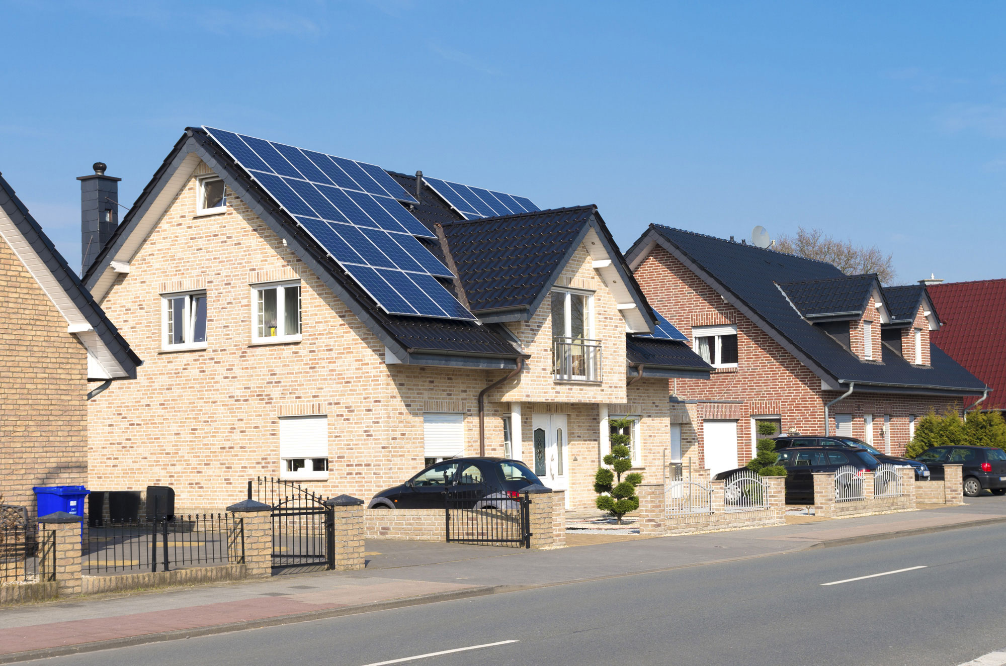 solar panels on light brick home 